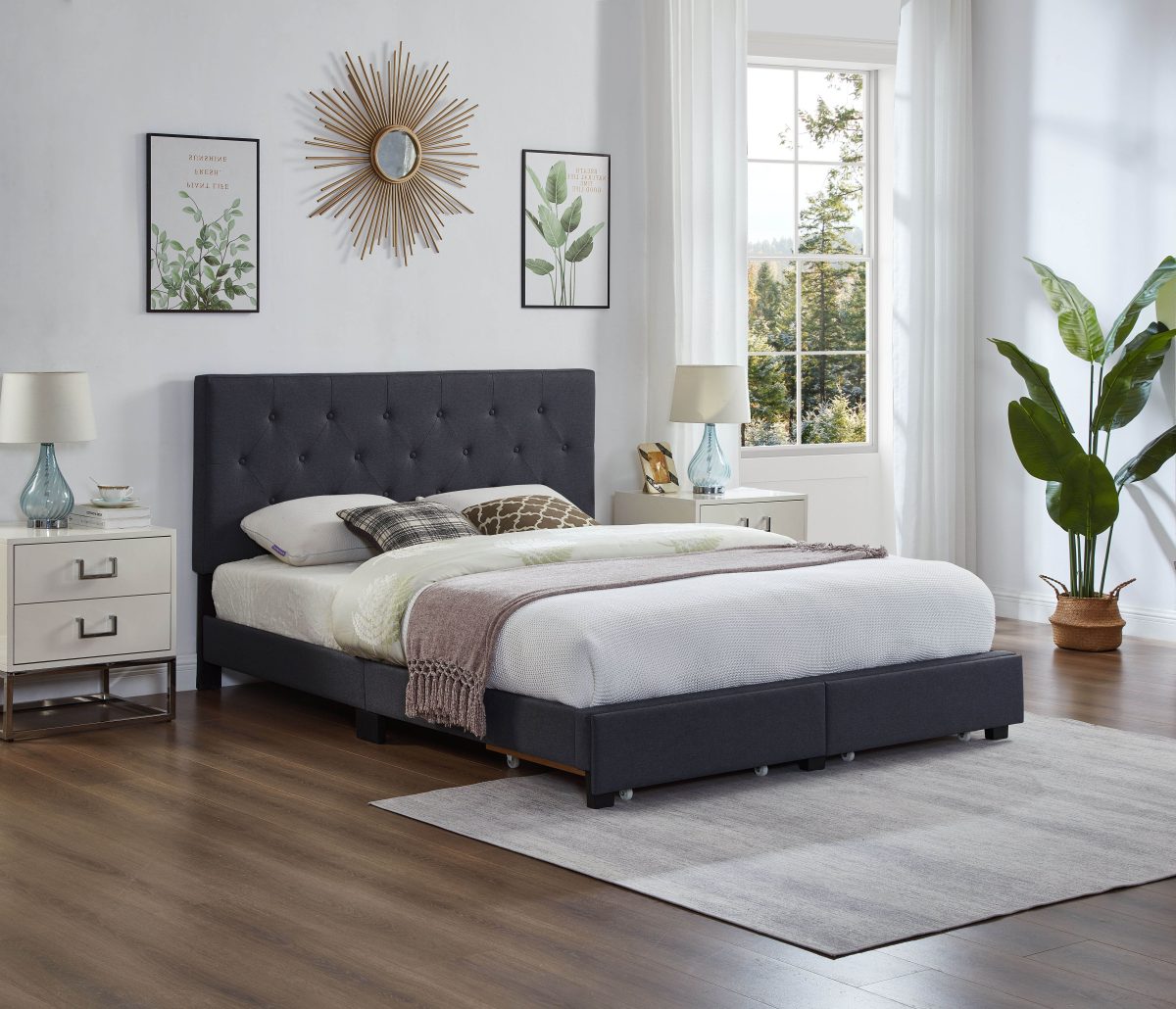 Grey button tufted platform bed in room with white wallpaper